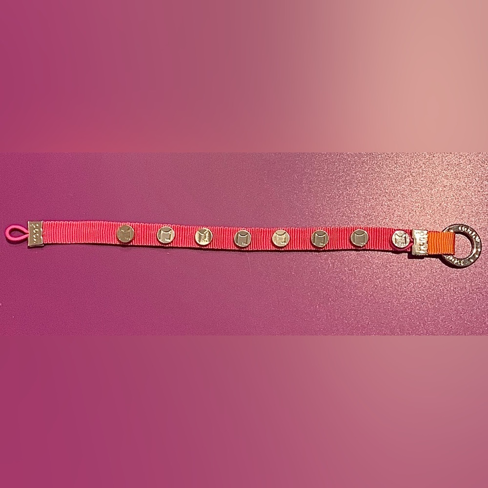 MOGO “We just click” bracelet.